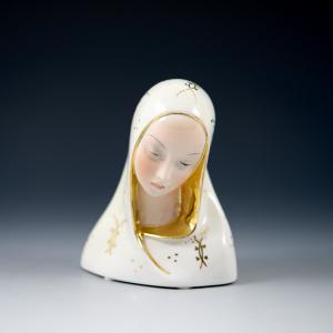 Madonna with a mantle decorated with small gold flowers